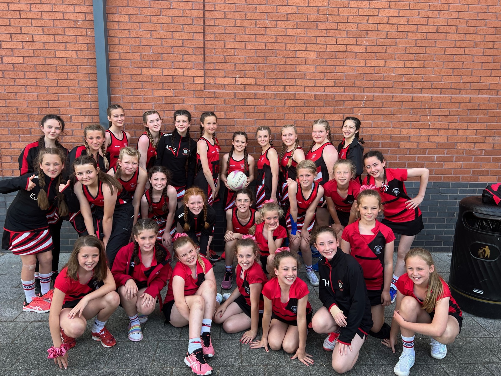A large group of Saddleworth Netball Club players together after a match
